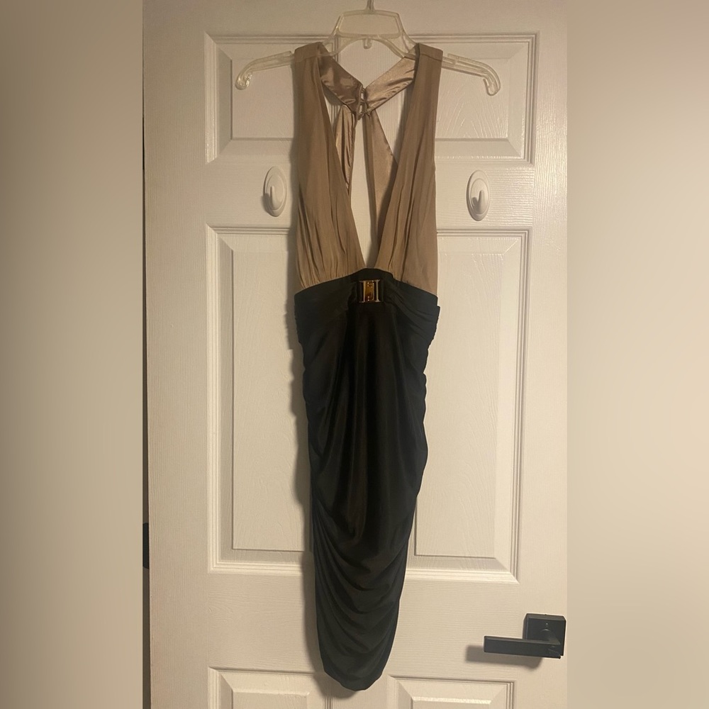 Bebe sexy dress black and beige stretchy material size M.